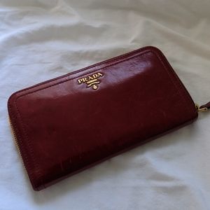 Prada red leather zip around wallet